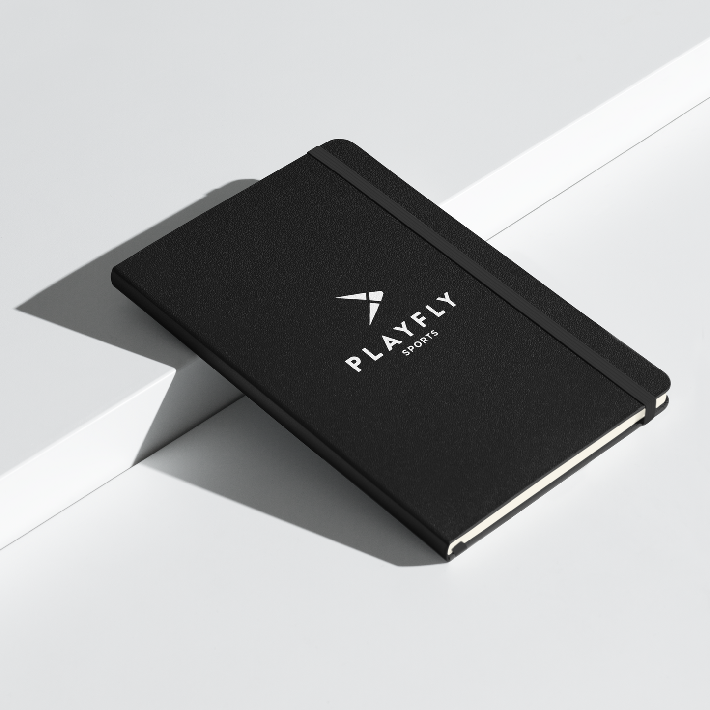 Playfly White logo - Hardcover bound notebook